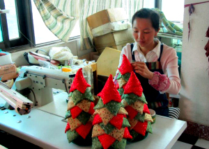 Deaf artisan Lei Mei enjoys steady employment with Hearts and Hands.